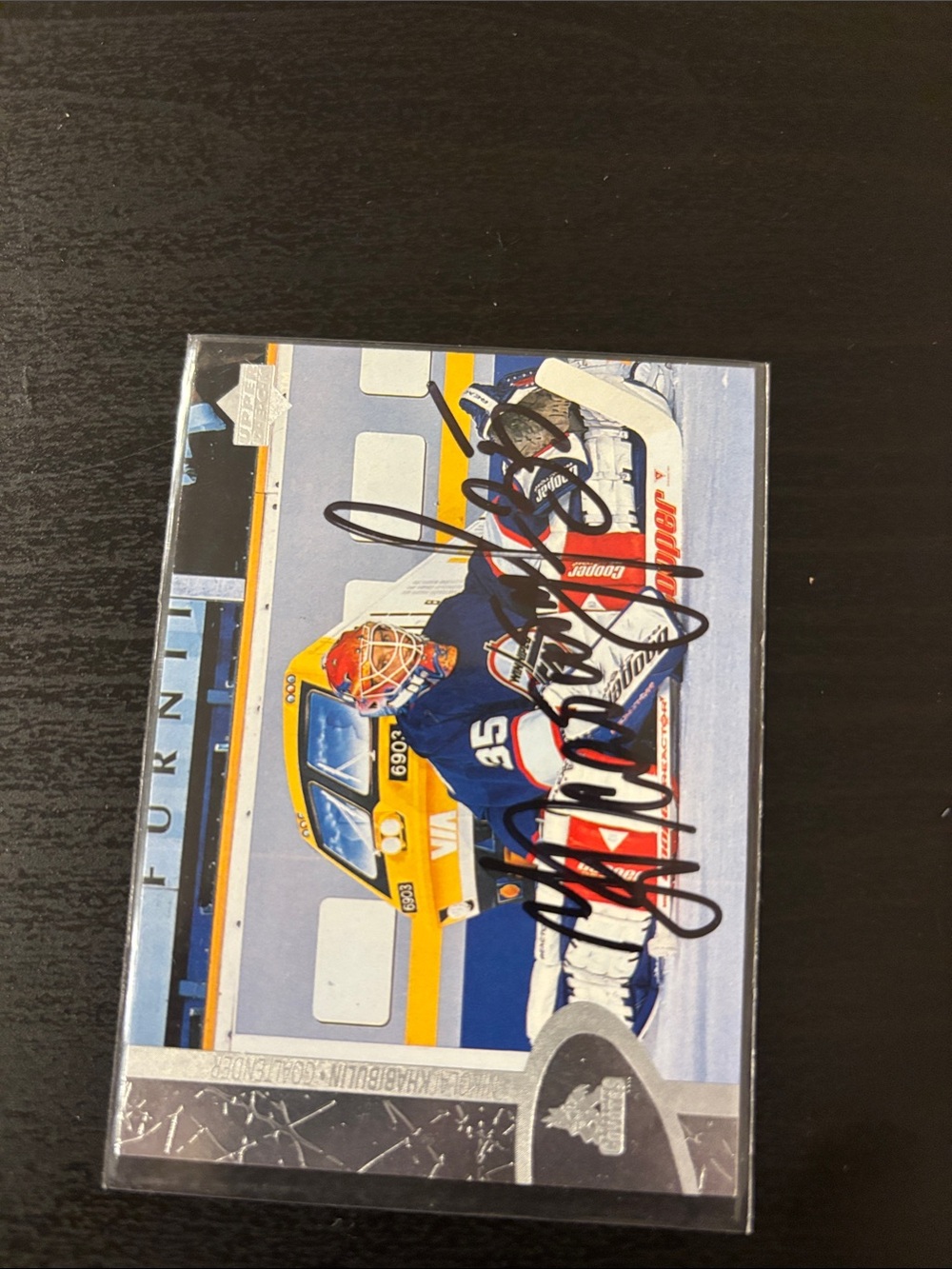 Signed Hockey Card with Blue and Yellow Design